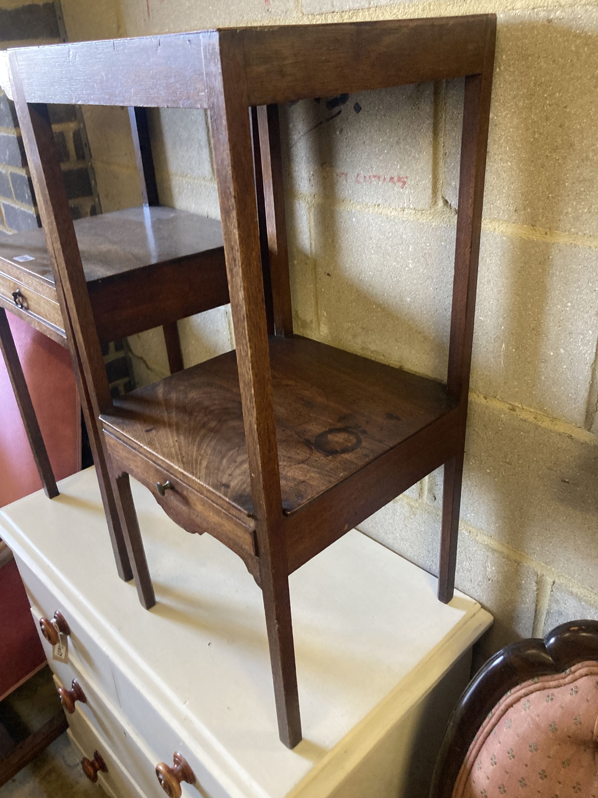 A near pair of George III mahogany washstands, larger width 35cm, depth 35cm, height 79cm